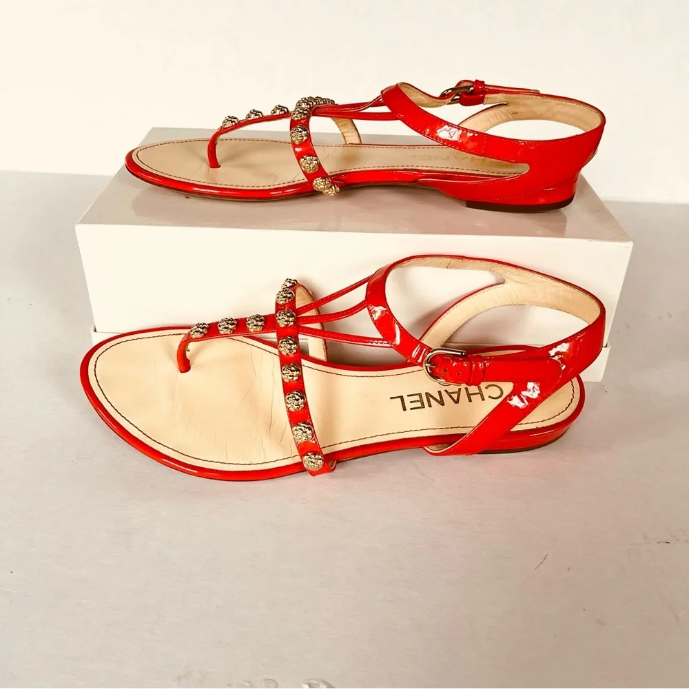 CHANEL coral red gold camellia studded flat sandals 38